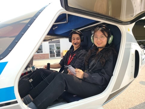UW Aviation students Zachary and Candice in the Velis