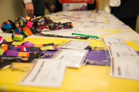 name tags scattered on a table.