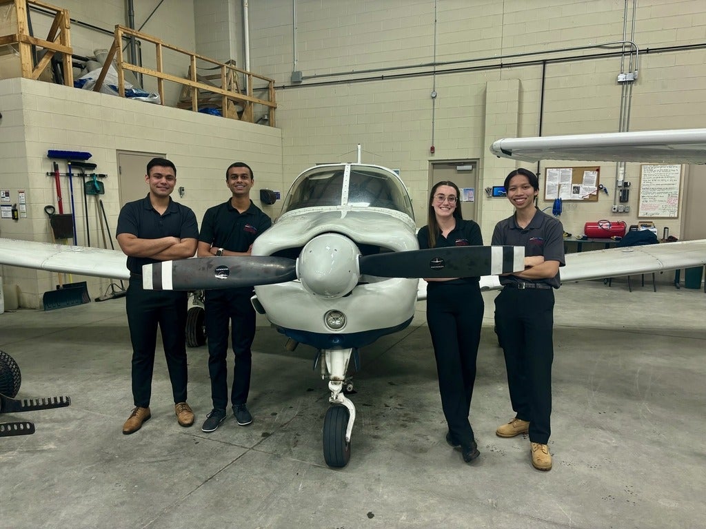 Group photo with plane