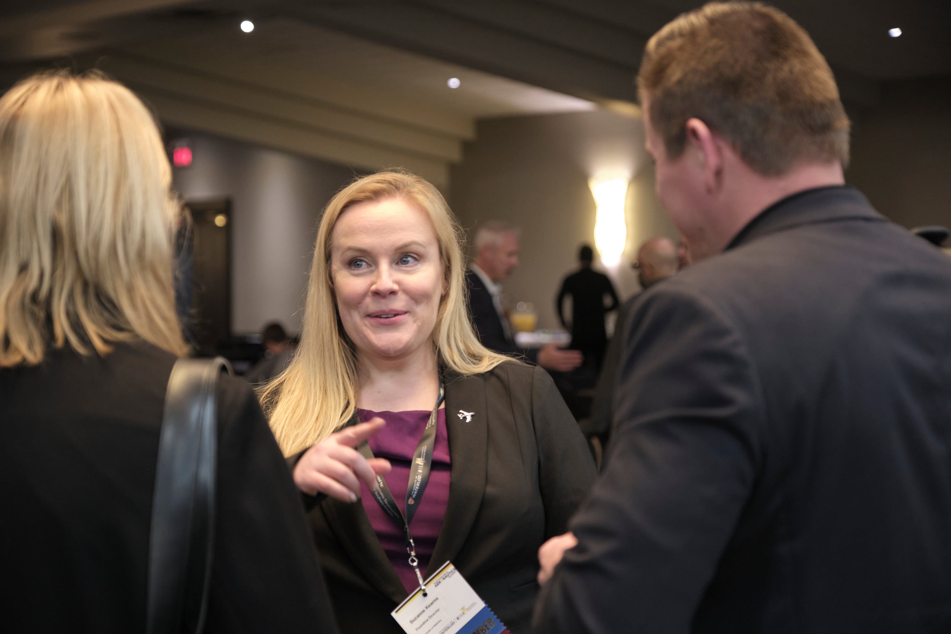 Suzanne Kearns networking with participants at the Summit