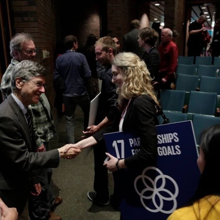 Dr. Jeffrey Sachs Shakes Hands with the Audience 
