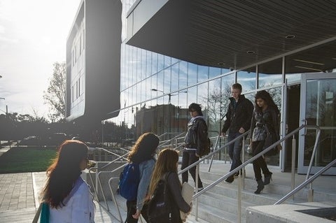 People walk into the Stratford campus building