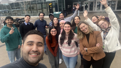 Group of people standing outside 