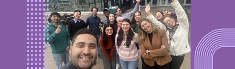 Dr. Catherine Burns with a group of students standing outside