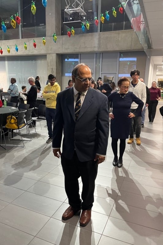 Ponnu and other attendees learning to Spanish dance