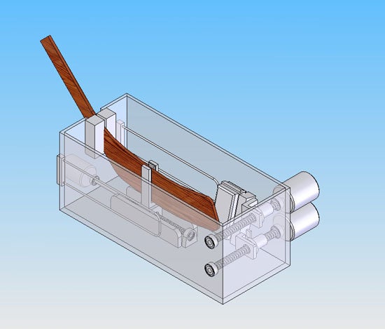 a prototype of the system with a hockey stick being folded.