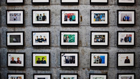 wall of framed photos