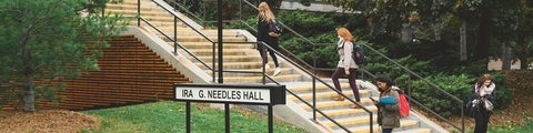 Students walking up the staircase of Needles Hall at the University of Waterloo