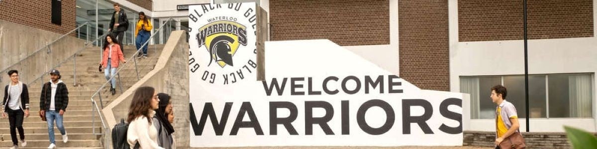 Welcome warriors with students walking