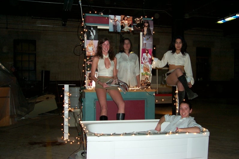 Four girls standing on set
