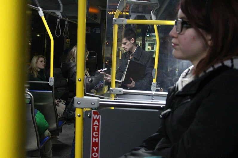People ride bus