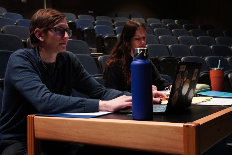 Assistant Stage Manager of Wardrobe Olivia Rossel and Assistant Stage Manager of Props Christopher DeLenardo oversee a rehearsal.