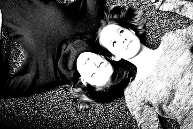 Rebecca Steiner & Kimberlee Walker lying on the ground