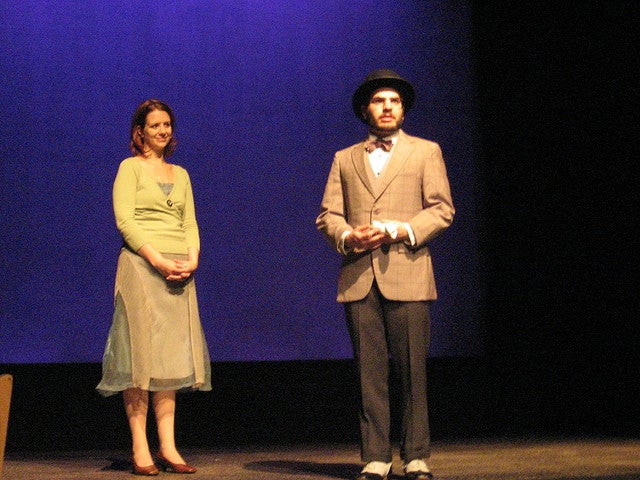 Man and woman on stage