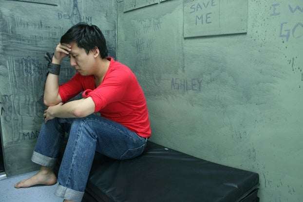 young man in cell