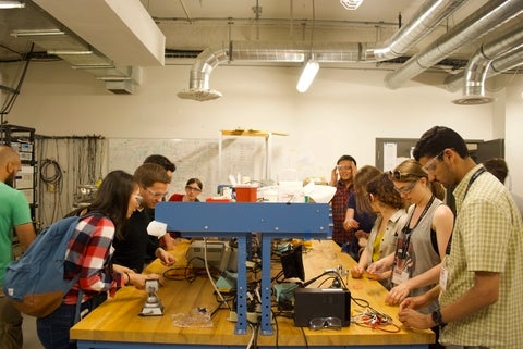 A group of people on two sides of the table