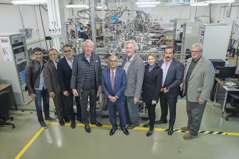 Group of people standing in a lab