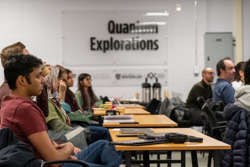 Participants listenig to presentation.