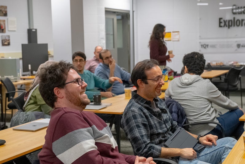 People listening to a lecture.