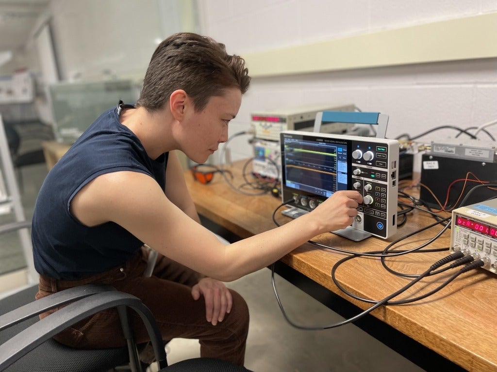 A person doing a demo of an equipment.