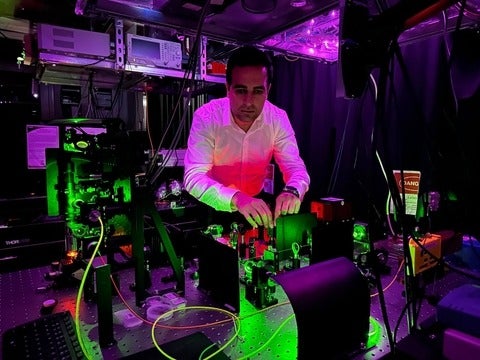 Abdolreza Pasharavesh with the experimental setup the group is now developing to test their theories