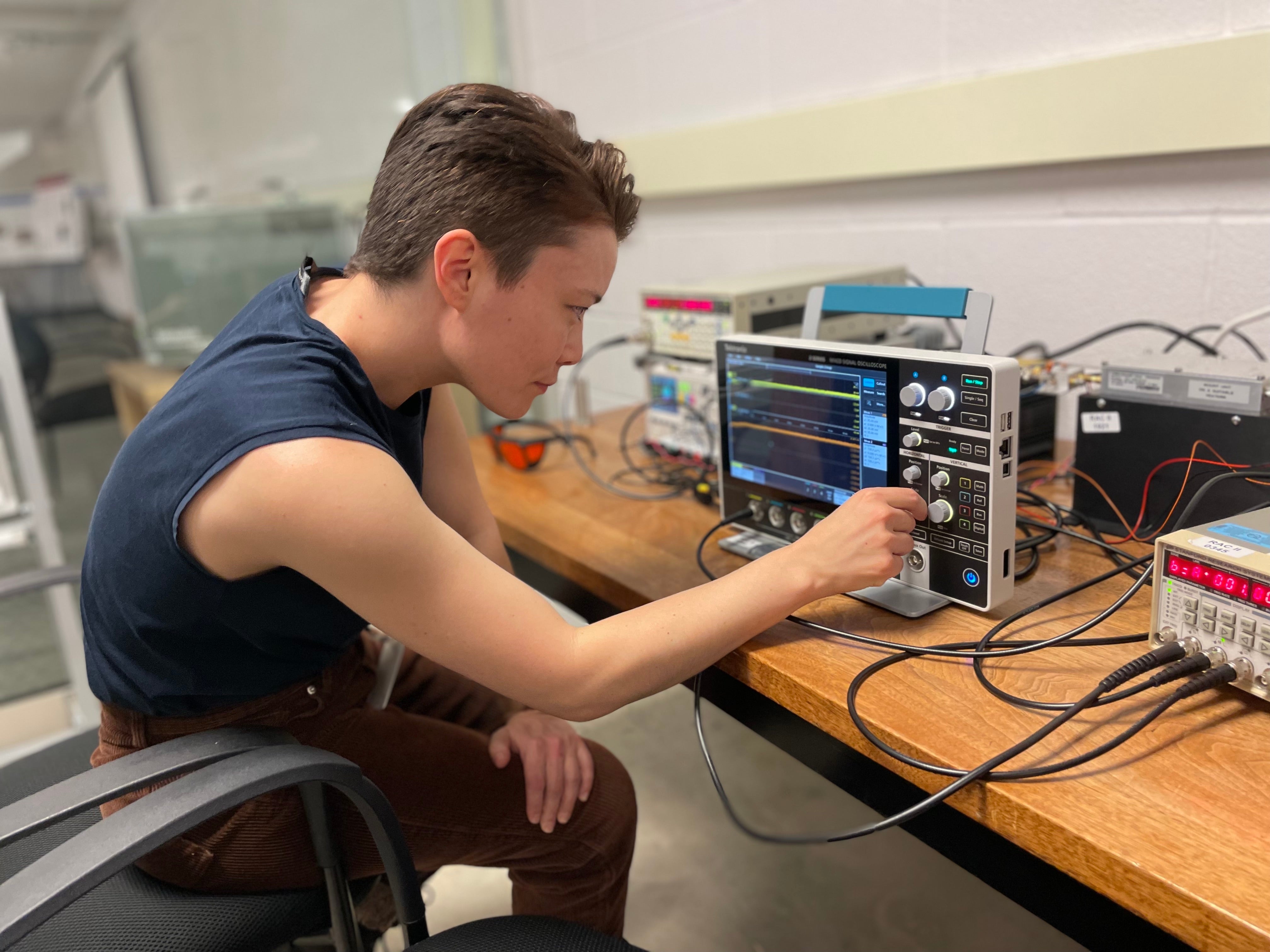 A person doing a demo of an equipment.