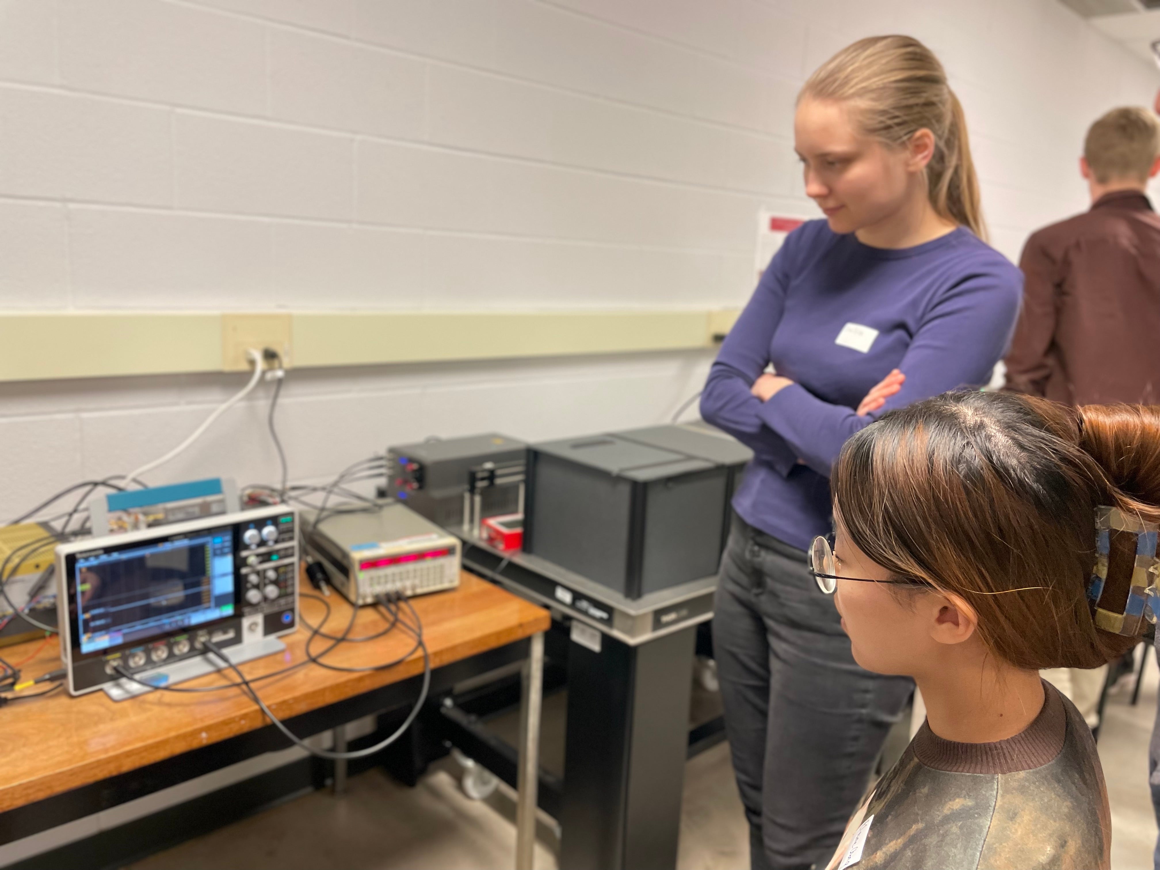 A person doing a demo of an equipment.