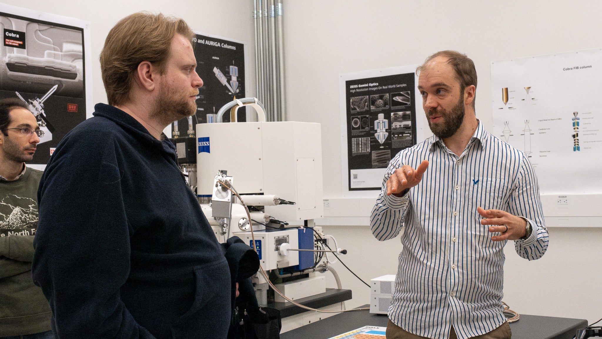 A person giving a tour of a lab