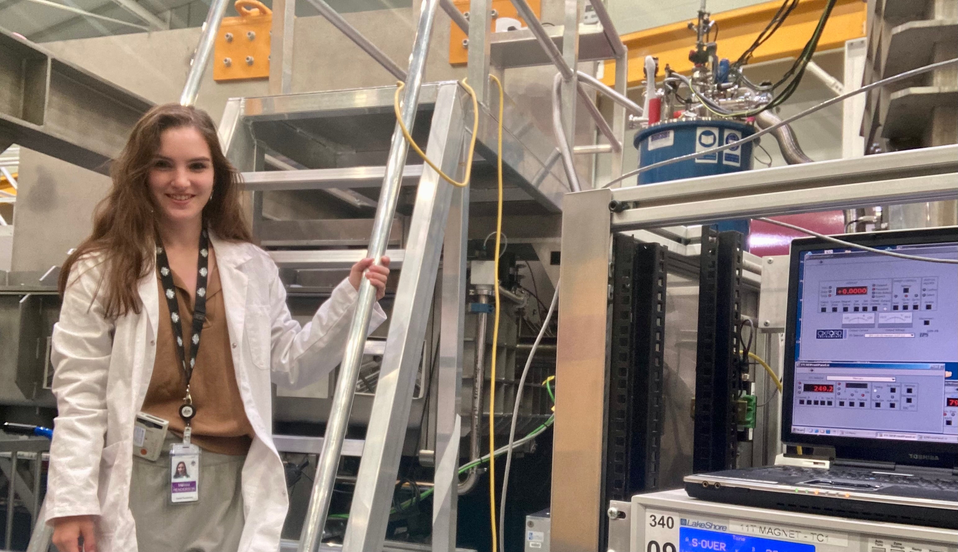 Melissa Henderson standing in a lab.