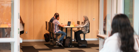 students sitting at a table