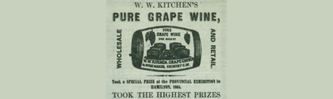 advertisement for W. W. Kitchen's Pure Grape Wine with barrel graphic, grapes, and text.