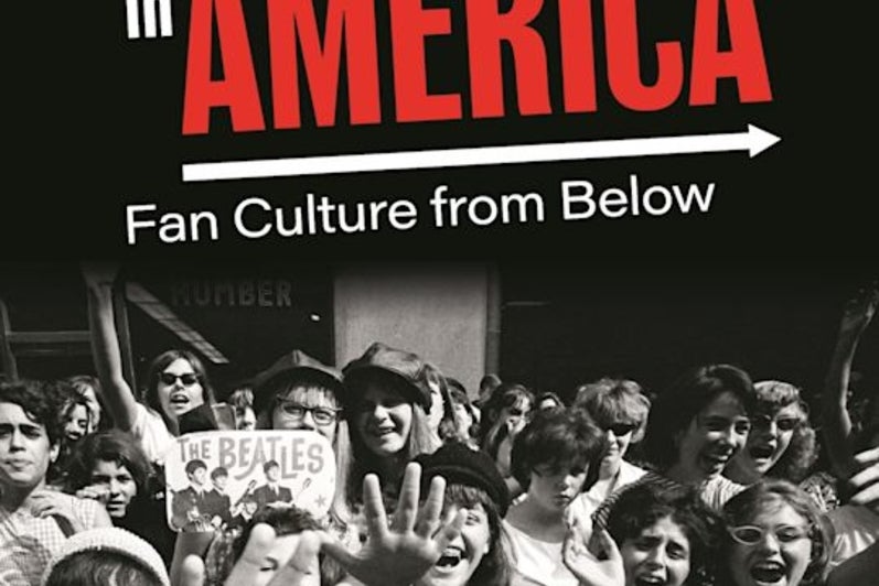 Music fans with Beatles photos with book title on top