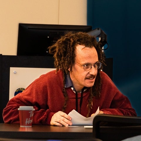 Kenneth Hall presenting at a conference