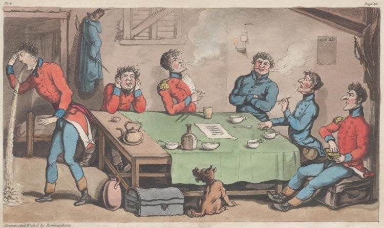 Men around a table drinking