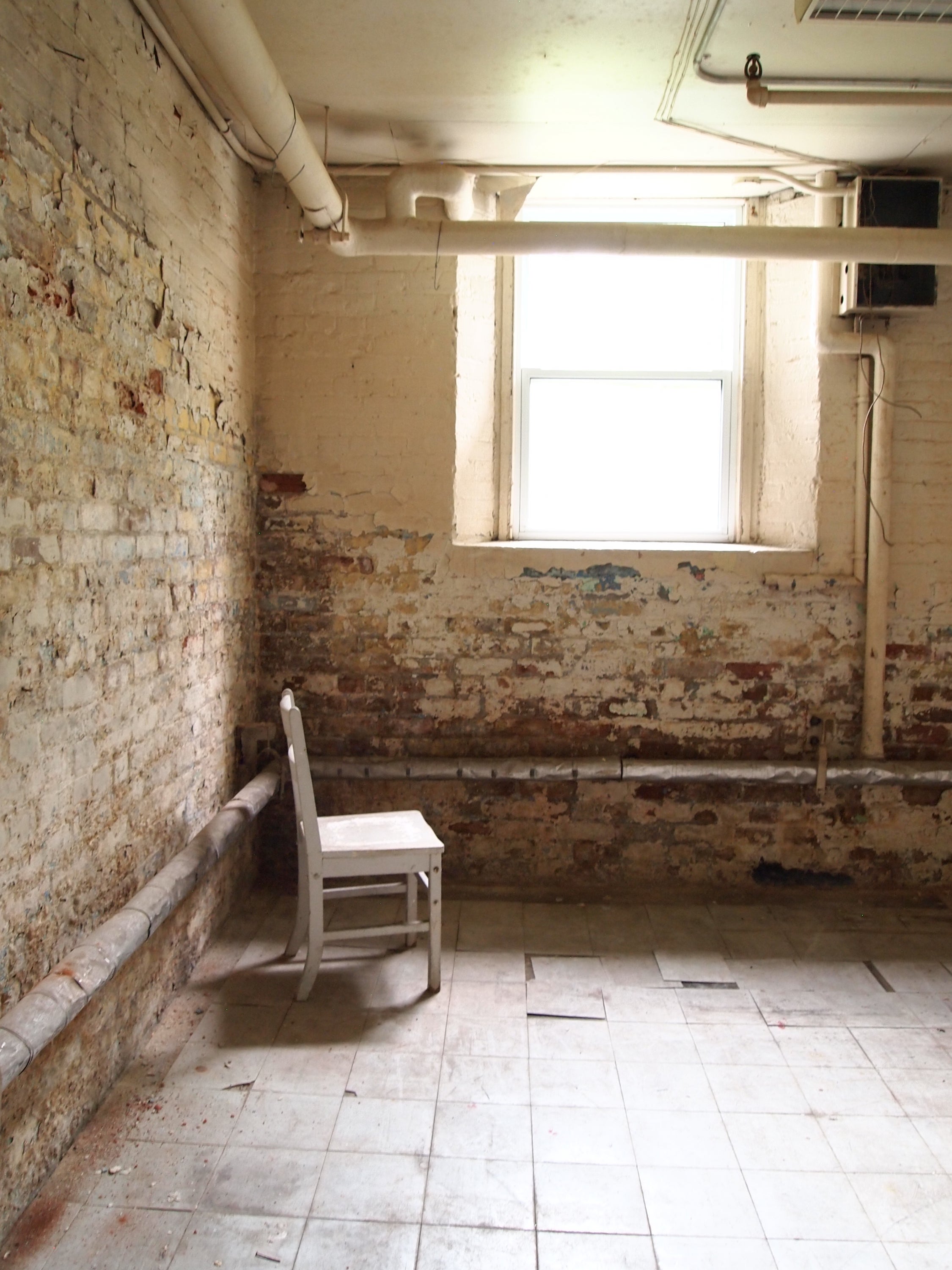 chair in empty basement room