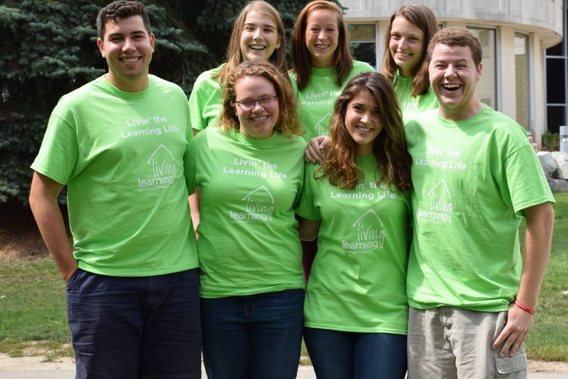 Group of students wearing green