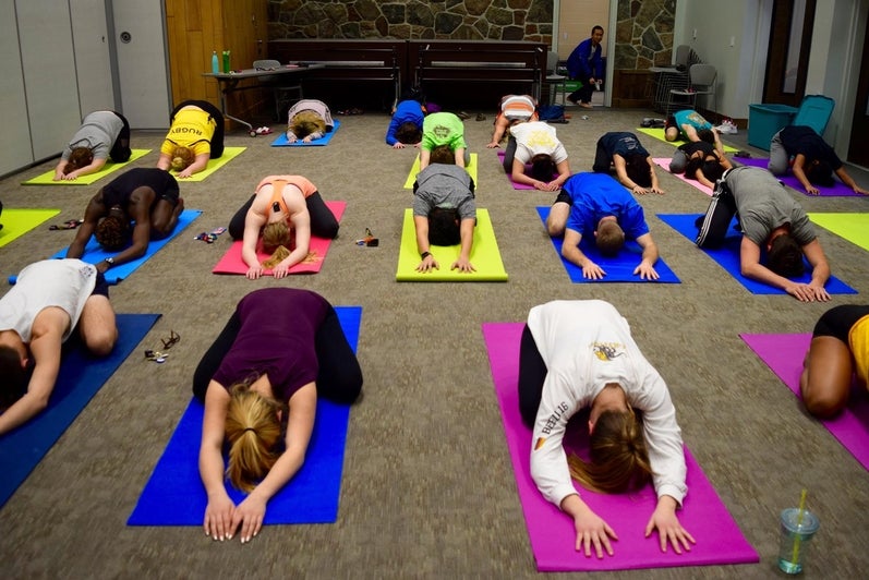 students participating in yoga