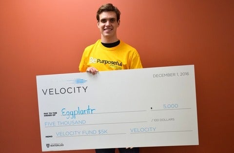 Michael Wideman with Velocity mock cheque