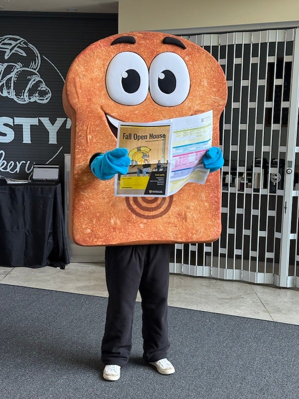 Toasty welcoming students to Fall Open House 