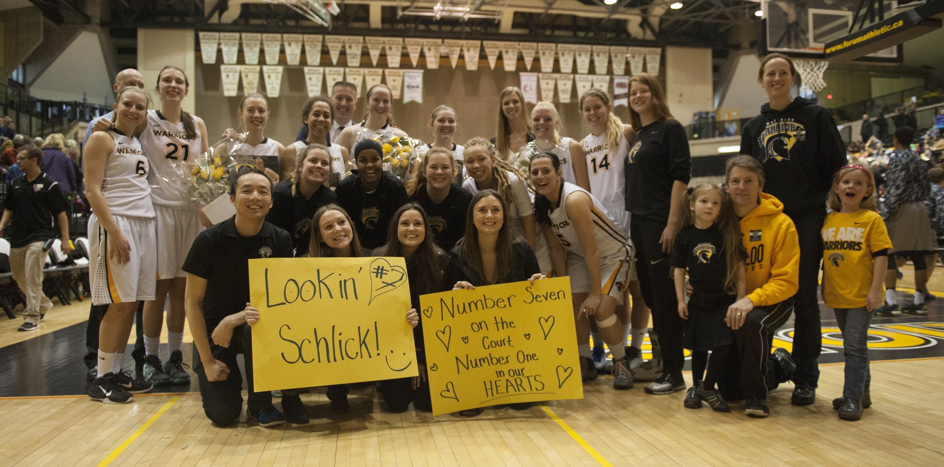 Women's basketball team and supporters