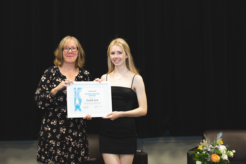 Elizabeth Beach accepting award