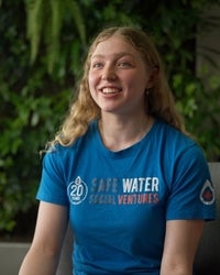 Professional portrait of a student facing the camera and smiling