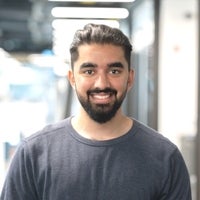 Professional portrait of a student facing the camera and smiling