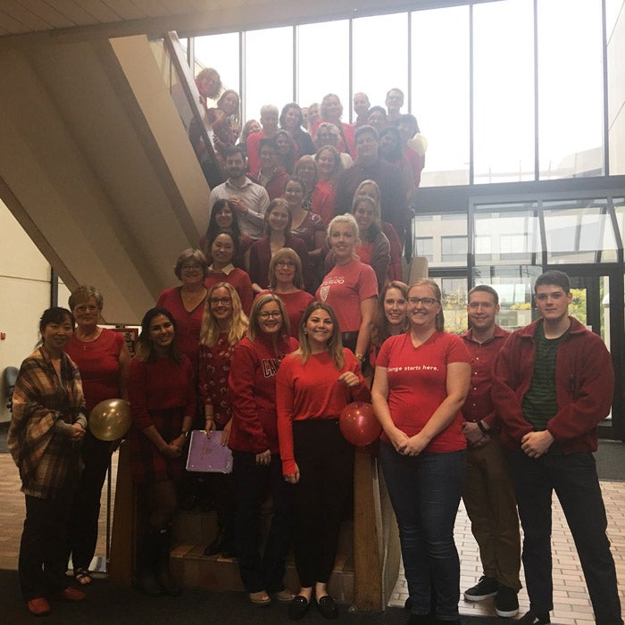 team of 25 people all wearing red shirts for United Way launch