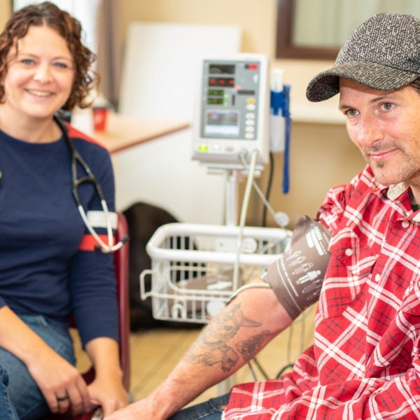 A man receives health care.