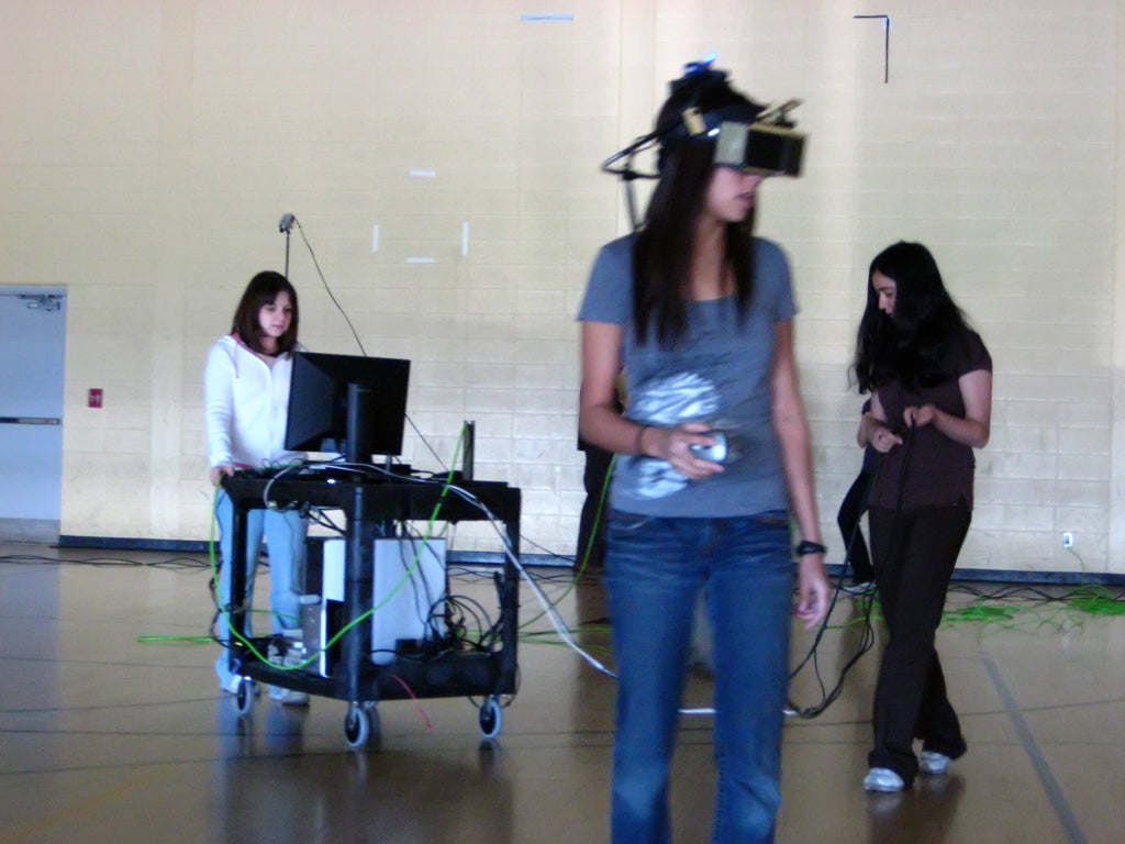 A female participant wearing head-mounted display in the gym