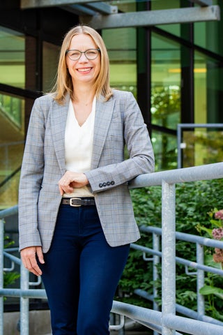 Jacinda Reitsma standing outdoors.
