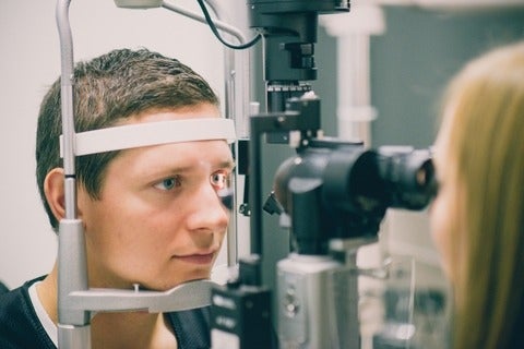 Athlete receiving an eye exam