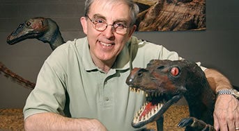 Peter Russell with fake dinosaur