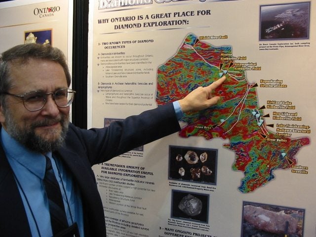Greg Stott of the Ontario Geological Survey points out the diamond occurences in Ontario